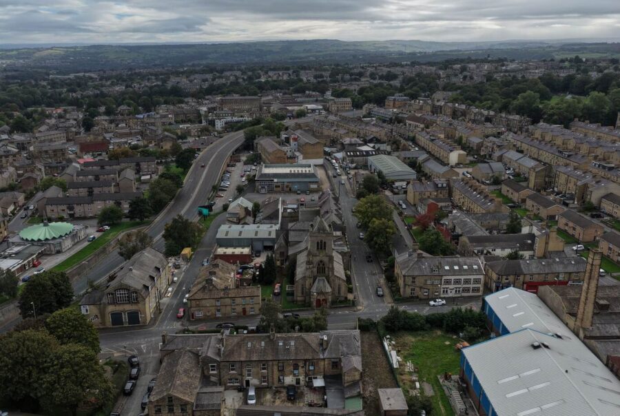 Aerial drone photograph showing St Mary’s Church in Halifax, including the main roof, tower and surrounding roof sections.